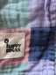 muslin swaddle - happy plaid
