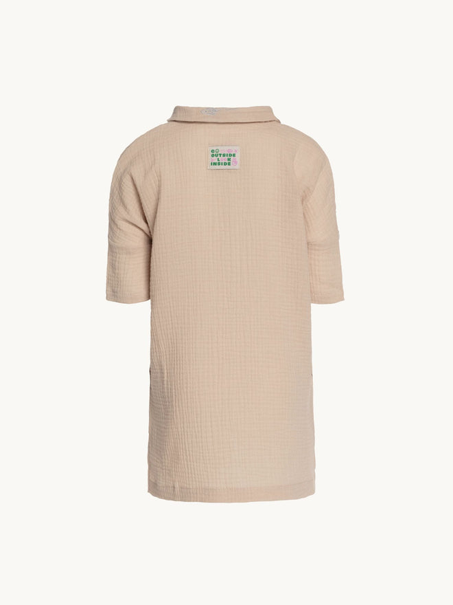sukienka dziecięca muślinowa bawełna organiczna sand muslin dress tył kremowa