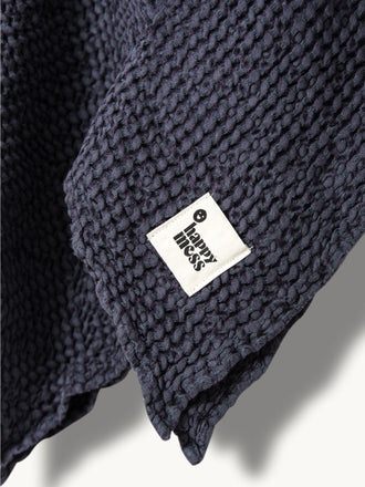 ponczo waflowe dzieciece lniane kąpielowe poncho blueberry granatowe detal logo