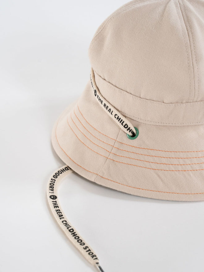 dziecięcy kapelusz beżowy bawełna organiczna bucket hat forest green detal sznurek