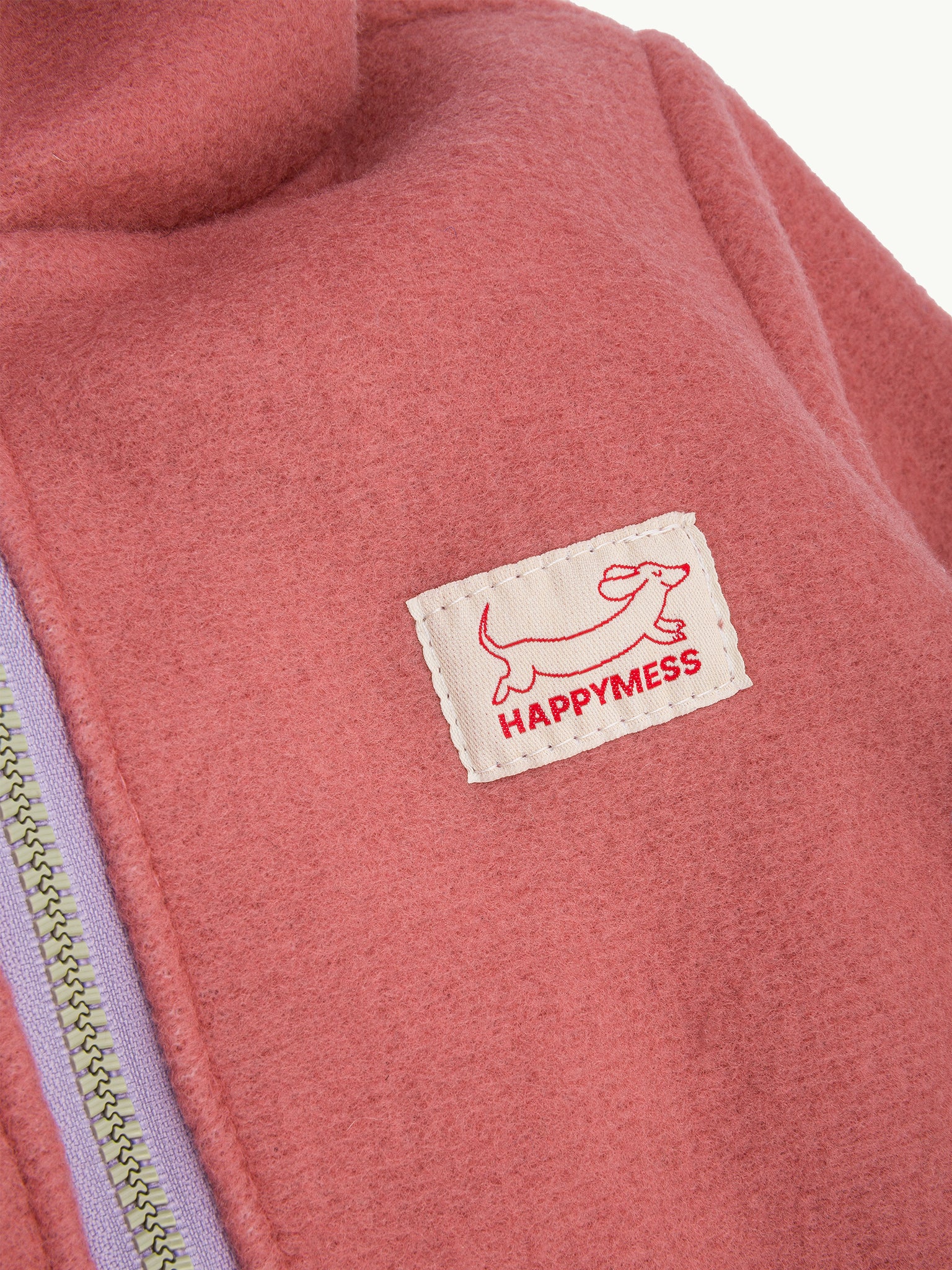 dziecięcy kombinezon wełniany cinnamon wełna merino wool jumpsuit overall detal logo jamnik