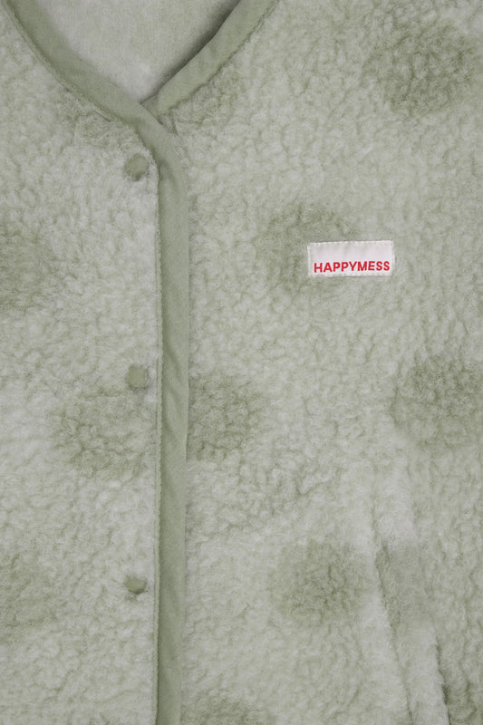 kamizelka wełniana merino unisex bezrękawnik zbliżenie logo polka dots