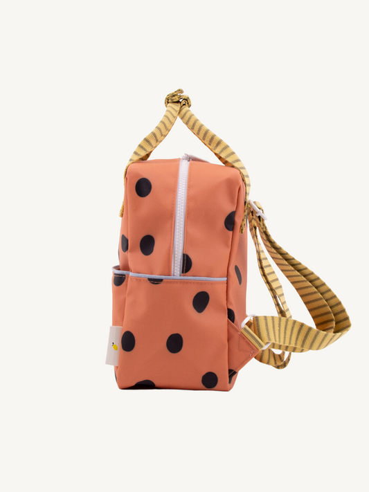 mały plecak deluxe pomarańczowy w kropki faded orange small backpak bok