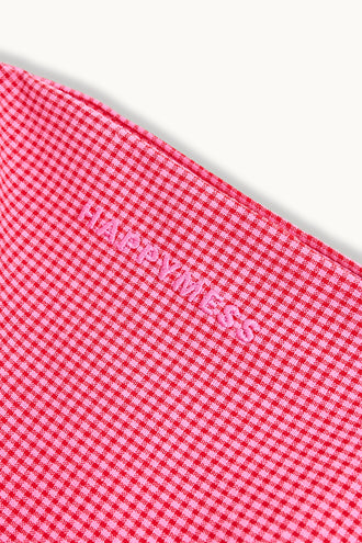 spodnie dziecięce w kratę z falbanką różowe wild berry detal haft