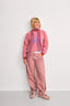 [pl][Modelka ma 168 cm wzrostu i nosi rozmiar S] [en][The model is 168 cm tall and wears size S] [de][Das Model ist 168 cm groß und trägt Größe S]  sweter damski wool blend star pink różowy gwiazda