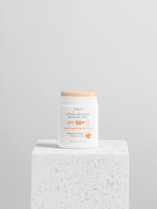 sztyft przeciwsłoneczny spf 50 golden złoty sunscreen stick tło