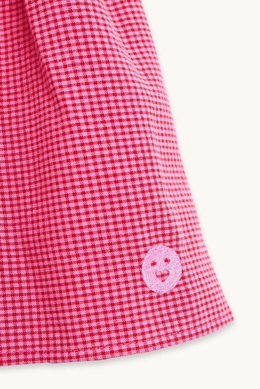 top dziecięcy z falbanką wild berry krata różowy detal