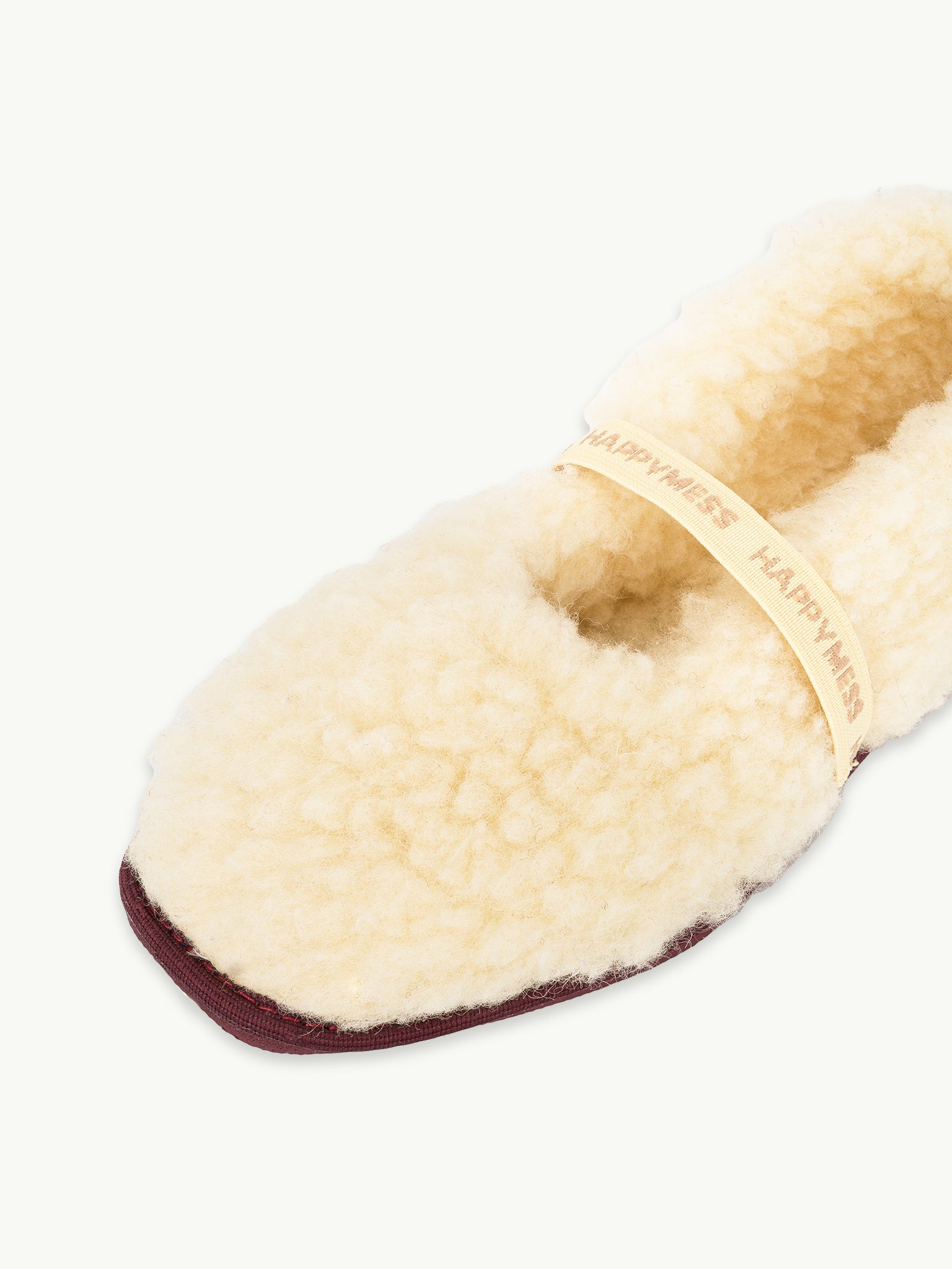 wełniane kapcie damskie merino z gumką masełkowe butter yellow woolen slippers bok detal